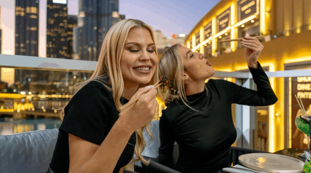 Two women having food in a restaurant