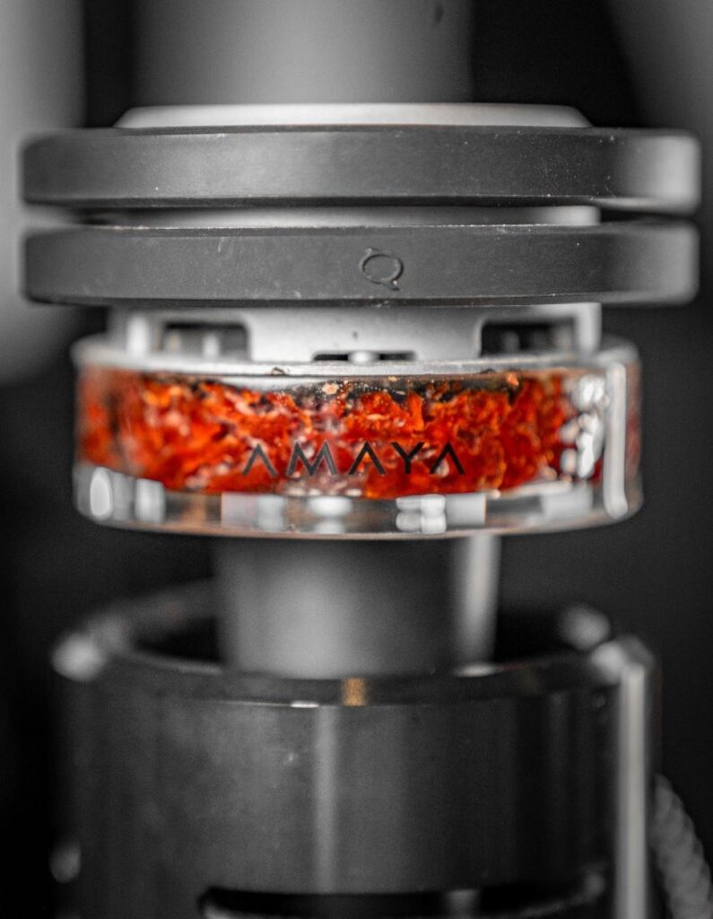 The closeup of orange and red flavor in shisha setup