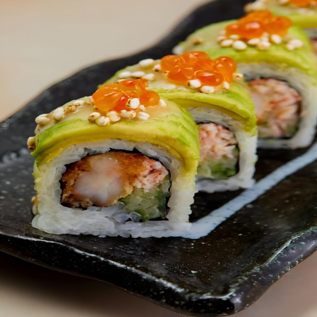Avocado-topped sushi rolls with shrimp and roe